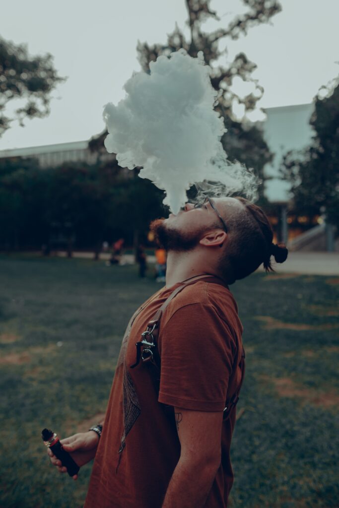 Image of a man smoking.